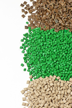 green brown and beige polymer resins on white の写真素材