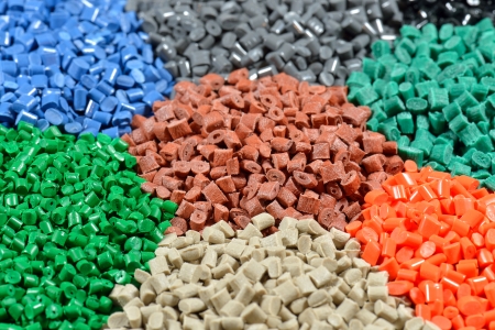 several dyed polymer pellets for plastic industry の写真素材