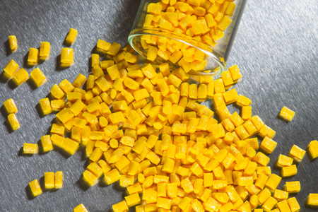 yellow polymer resin in laboratory on stainless steel surface