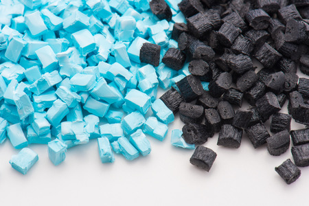 blue and black plastic granulates for injection molding industry