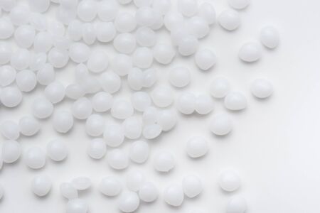 white polymer plastic resin on white backgroundの写真素材