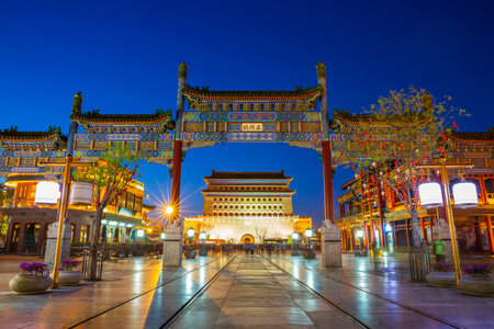 The night view of the Chinese - style archway and Zhengyangmen Gate Tower on Qianmen Street in Beijing. Chinaの写真素材