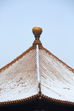Snowscape of ancient architecture in the Forbidden City, Beijing, China.の写真素材