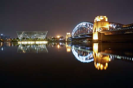 Jinguang Bridge and City Library night view in Suzhou, China