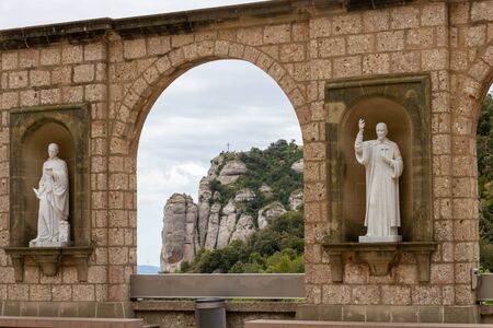 View from monastry of Montserrat to the mountain with the crossの写真素材