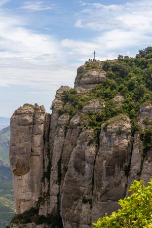The cross is made on very impressive hight and only reachable for hikers by a small trailの写真素材