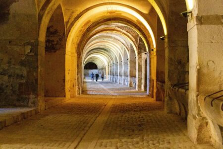 FIGUERES, SPAIN - MAY 16, 2012: People walking in stables at Sant Ferran Castleのeditorial素材