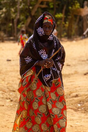 JUFUREH, GAMBIA- JAN 12, 2014: Beautiful older african woman. Mayor of Jufureh and ancestor from Kunte Kinteのeditorial素材