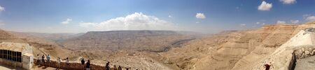 Wadi Mujib, Jordan - Sept 20, 2013: Panoramic view from tourists who look over the Wadi Al Mujib valley with was formed in the last ice age. It's very impressive and also called the grand canyon of Jordanのeditorial素材