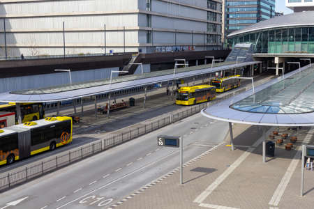 Utrecht, the Netherlands - 16 Mar, 2020: Bus station at Utrecht Centraal where people arriving or taking a bus to their destinationのeditorial素材