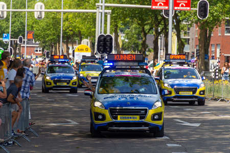 Utrecht, the Netherlands - 5 Jul, 2015: Gendarmerie cars just before the Tour the France starts to inform people not to go on the roadのeditorial素材