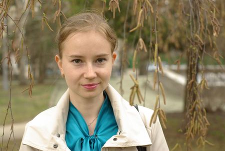 girl under the birch-tree in springの写真素材