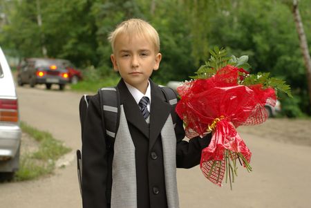 boy in school uniform in a streetの写真素材
