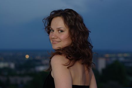 Smiling girl and cityの写真素材