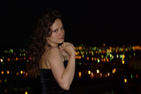 Female and night cityの写真素材