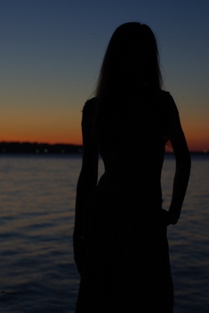Ghostly female by the waterの写真素材