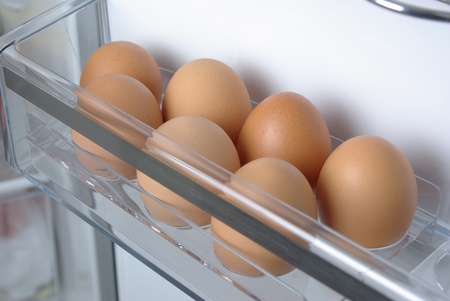 Chicken eggs in the fridgeの写真素材