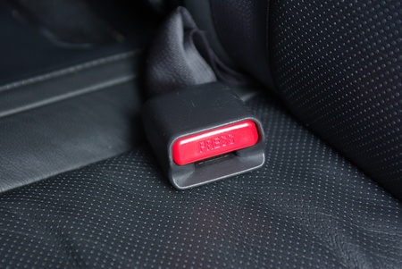 Seatbelt buckle on a car seatの写真素材