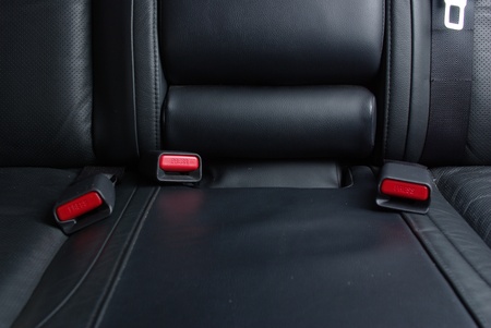 Seatbelt buckles on seat in carの写真素材