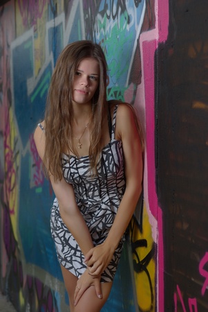 Girl against graffiti wallの写真素材