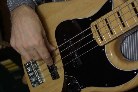 Man playing an bass guitarの写真素材