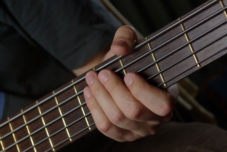 Man playing an bass guitarの写真素材