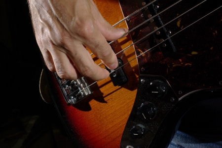 Man playing an bass guitarの写真素材
