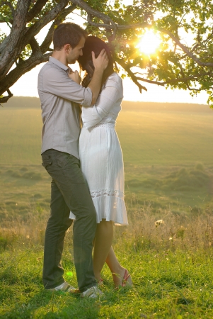 Couple sweethearts under treeの写真素材