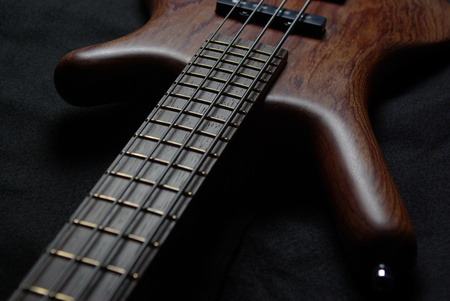 Bass guitar with brown bodyの写真素材