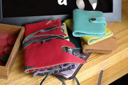 Leather wallets on wooden tableの写真素材