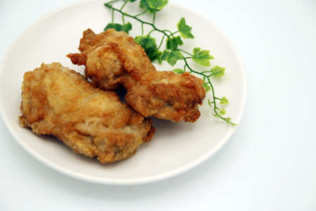 Fried chicken on white backgroundの写真素材