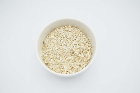 Oatmeal on a white backgroundの写真素材