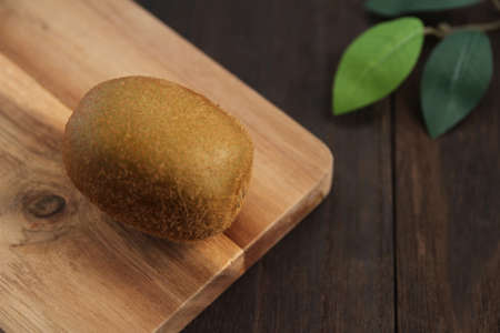 Kiwi on a wooden tableの写真素材