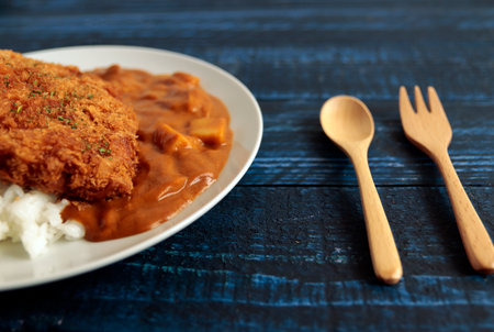 Cutlet curry on a blue tableの写真素材