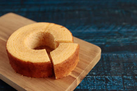 Eating Baumkuchen as a gift at a wedding ceremony at the table at tea time