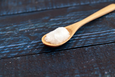 Salt in a jar that resembles a drug on the tableの写真素材
