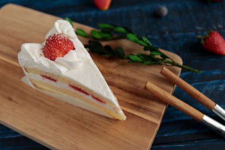 Christmas and birthday shortcakes on the tableの写真素材