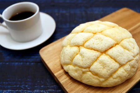 Melon bread, a sweet dessert bread that is a staple of Japan on the tableの写真素材