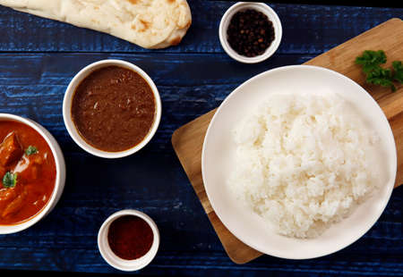 Indian curry and rice on the tableの写真素材