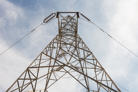 The transmission tower on blue sky backgroundの写真素材