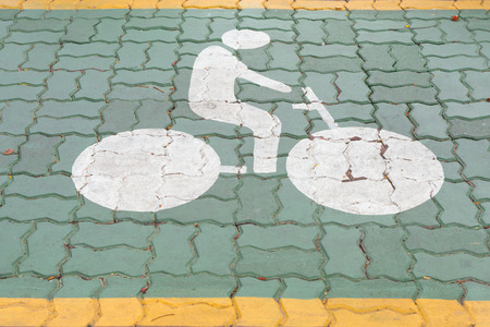 bicycle lane sign on road.の写真素材