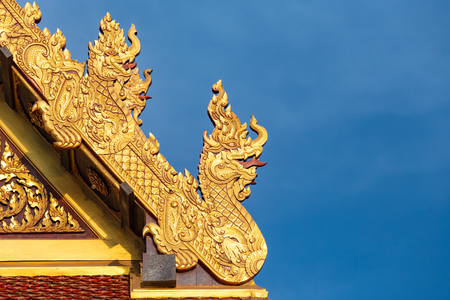 The Beautiful Texture of The King of Nagas or Serpents (Giant snake) on the top of roof in public temple.の写真素材