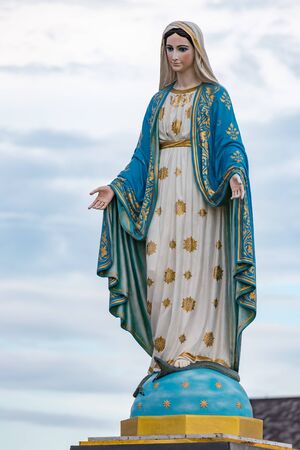 The Blessed Virgin Mary in front of the Roman Catholic Diocese, public place in Chanthaburi,  Thailand.の写真素材