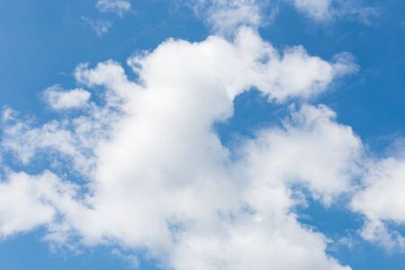image of clear blue sky and white clouds on day time for background usage.の写真素材
