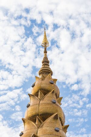 The top of pagoda on blue sky in the public temple in Thailand.の写真素材