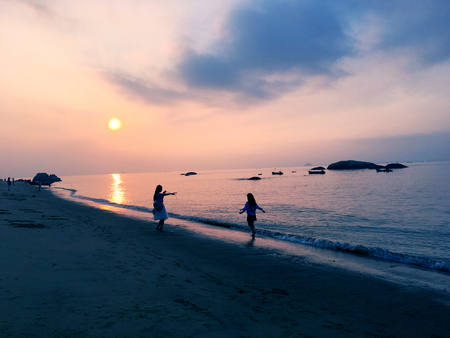 Sunrise by the seaの写真素材