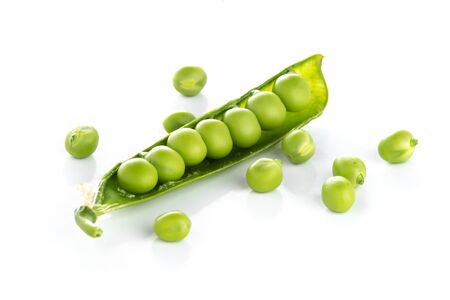 stalk of green peas on a white backgroundの写真素材