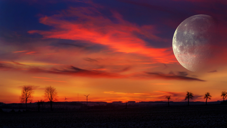 Moon night. Winter landscape. bright clouds and moonの写真素材