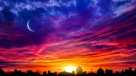 Crescent moon with beautiful sunset background. Generous Ramadan. Light from sky. Religion background. city silhouette mosqueの写真素材