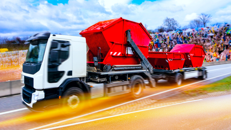 Garbage collection. garbage truck truck. Urban recycling waste and garbage servicesの写真素材